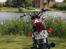 Suzuki GN 250 - Ved en af Maribo søerne. I baggrunden ses Maribo domkirke fra 1416