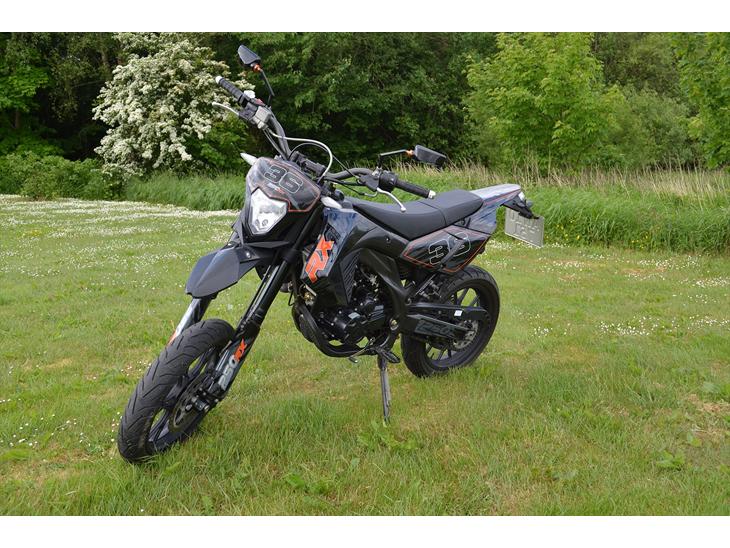 KTM Apollo orion rx 250 - det kan ikke rigtig ses, med der er sat xenon-hvid pos pære i lygten. billede 1