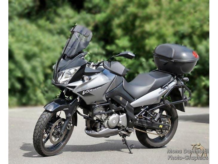 Suzuki v-strom dl650 solgt 2014 - truntens hobby er at tage billeder. så det fik hun lige lov til billede 1