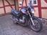 Honda CB500 - Står standart, bortset fra den lille vindskærm - og en styrende der mangler.