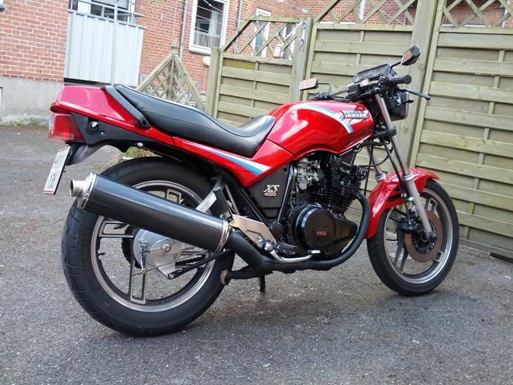 {{currentPhoto.altText}} billede {{currentPhoto.number}}