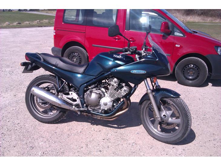 {{currentPhoto.altText}} billede {{currentPhoto.number}}