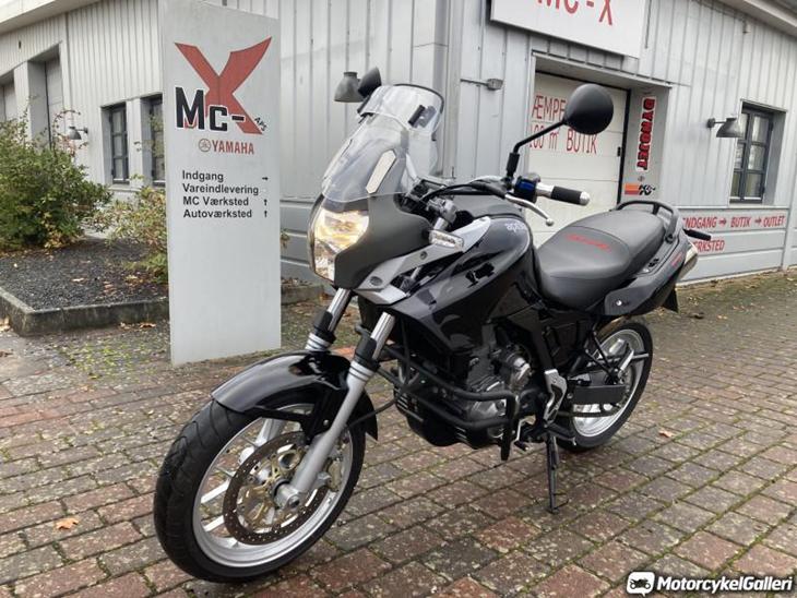 {{currentPhoto.altText}} billede {{currentPhoto.number}}