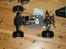Projekter og diverse bl biler - Min kreation, som er udsprunget fra en gammel prafa 1:8/1:9 nitro rally bund og tilhørende bagtøj med kraftigt diff. fortøjet er fra en sprit ny oldsag af en tamiya hot shot truck og samme med dæk og fælge (12mm hex). jeg har forstærket bunden og afstivet den med 2mm carbon plader som ligger dobbelt de udsatte steder. der er monteret en stor outrunner motor med 6mm aksel der trækker via dogbone direkte ind i diffet. den skulle være på omkring 1200watt. den skal køres på 5 cells lipo til at starte med men regner med 6- eller 8 lipos  hvis den kan holde til det :)
har selv fundet løsninger til at afstive chassis og der er brugt en del skruer og møtrikker samt masser af epoxy og cyanolim (har ikke vejet den endnu :S )

