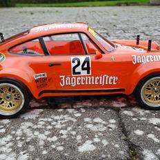 Bil Tamiya Porsche 934 TA02SW (40 års jubilæumsudgave)