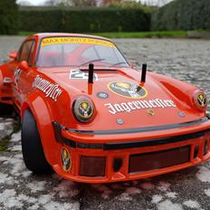 Bil Tamiya Porsche 934 TA02SW (40 års jubilæumsudgave)