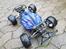 Buggy Traxxas Slash 4x4 Ultimate - Dusty Motors coveret efter en tur uden body i regnen