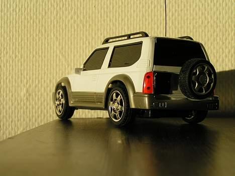 Bil Toyota Land Cruser - Skråt bagfra billede 18