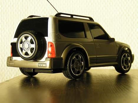 Bil Toyota Land Cruser - Skråt bagfra igen billede 19