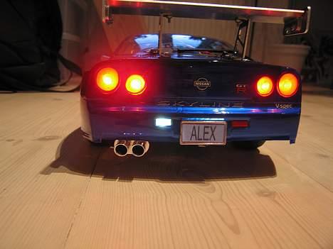 Bil Nissan Skyline R34 GT-R V.Spec Tamiya TT-01 - Et billede med baklys billede 3