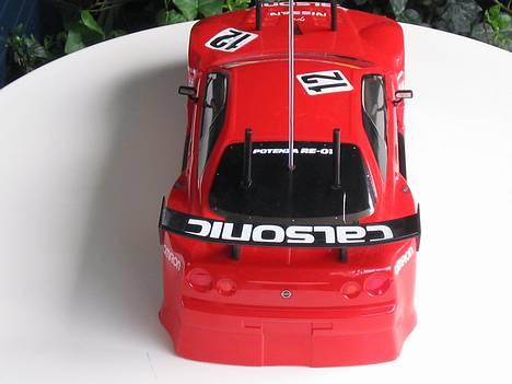 Bil Tamiya  Nissan calsonic - Jeg kan godt lide af min nissan calsonic er så langt nede men den samler mange gode sten med op  billede 7