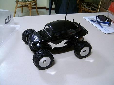 Truck Team Losi Mini-T - De nye Chromefaelge med daek passer godt til XXX-main flammen paa siden. billede 1