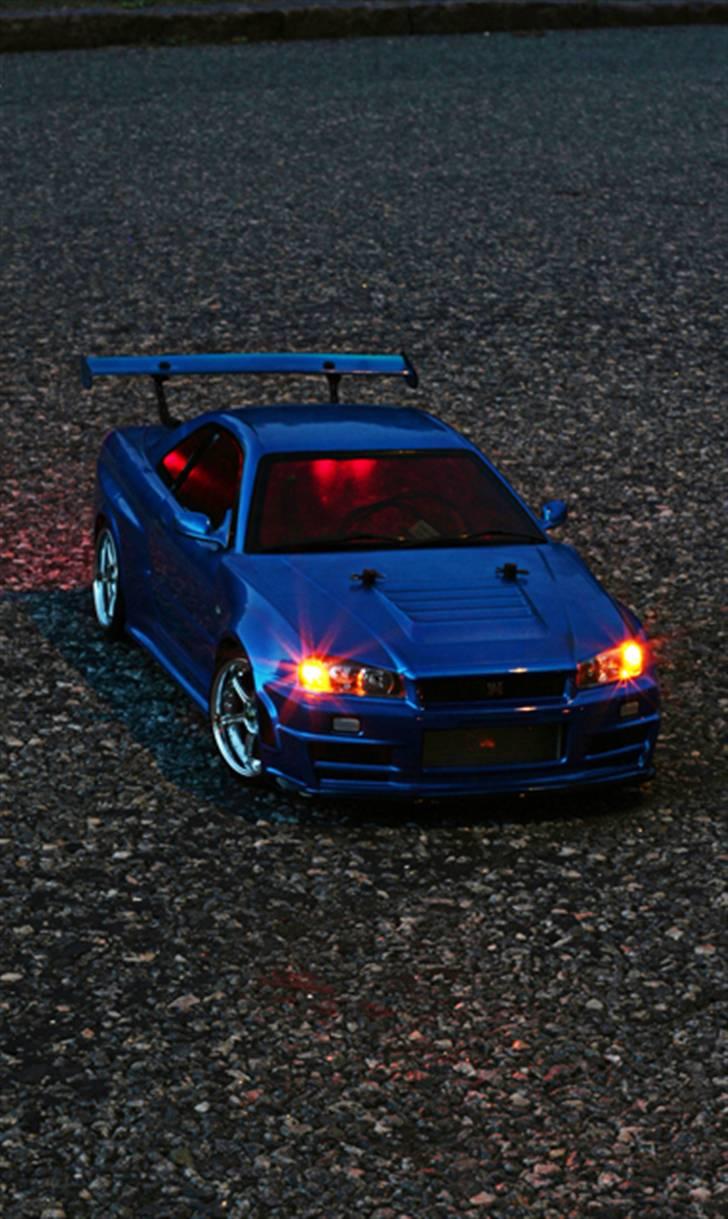 Bil Nissan Skyline R34 GT-R Nismo Z-Tune Tamiya TT-01 - der var ikke så meget strøm tilbage, så de hvide dioder gik ud, men de orange og røde dioder lyste stadig fint nok. billede 22