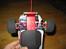 Truck LOSI Mini-T - Wheelie bar fra anden vinkel. Man ser at det er en komplet add-on der går langt under bilen.