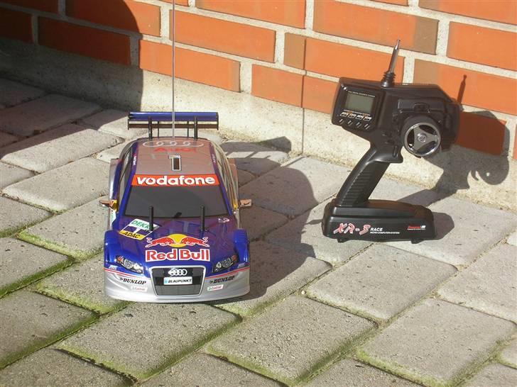 Bil Tamiya  TT-01-solgt - bilen på en dejlig solskins dag billede 1