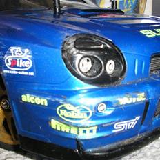 Bil Subaru Impreza TG10-Mk.1