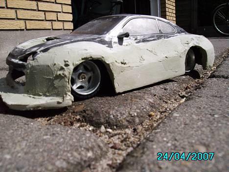 Bil Nissan Silvia - Der mangler stadig rigtig meget slibe og spartelarbejde ! billede 4