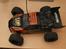 Off-Roader Stealth X09 Truggy Brushl - Bilen set lidt fra oven med karossen på, den er lidt medtaget, grundet den ikke bare står til pynt.