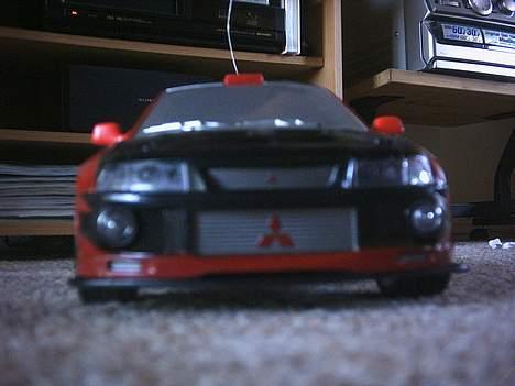 Bil Mitsubishi Lancer Evo (QD - Afblegede forlygter billede 3