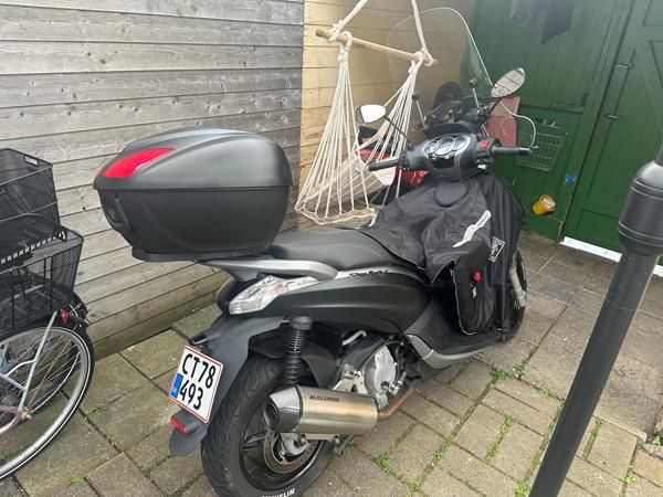 Scooter stopper med at trække