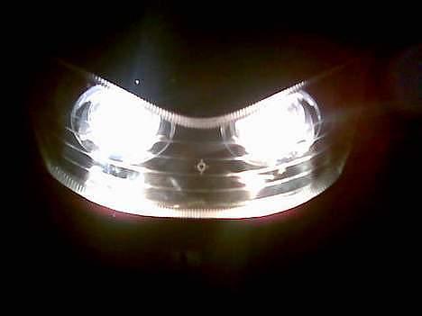 CPI Popcorn {Neon} Solgt - Billede af forlygten mens den er tændt billede 13