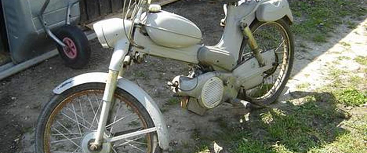 A vintage scooter instrument panel, illustrating the kind of read‑out hobbyists might compare to a Chicago Doppler radar live display
