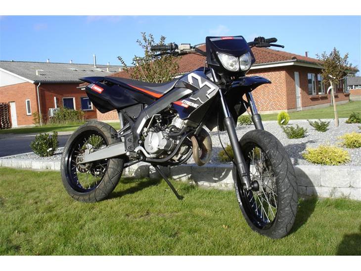 {{currentPhoto.altText}} billede {{currentPhoto.number}}