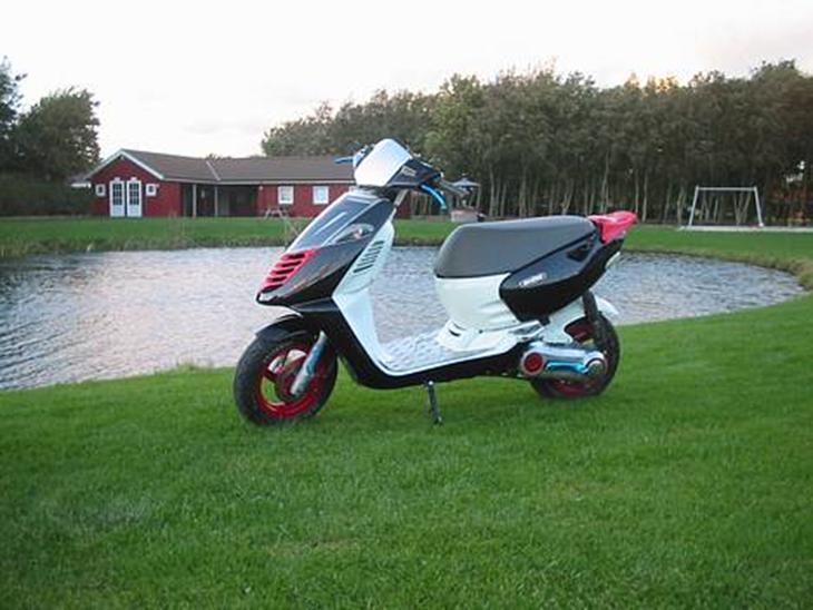 {{currentPhoto.altText}} billede {{currentPhoto.number}}