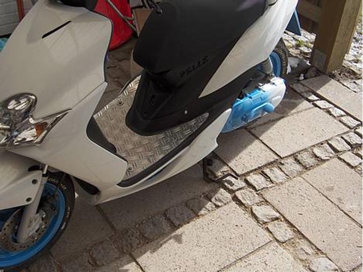 {{currentPhoto.altText}} billede {{currentPhoto.number}}