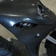 PGO PMX NAKED CARBON  