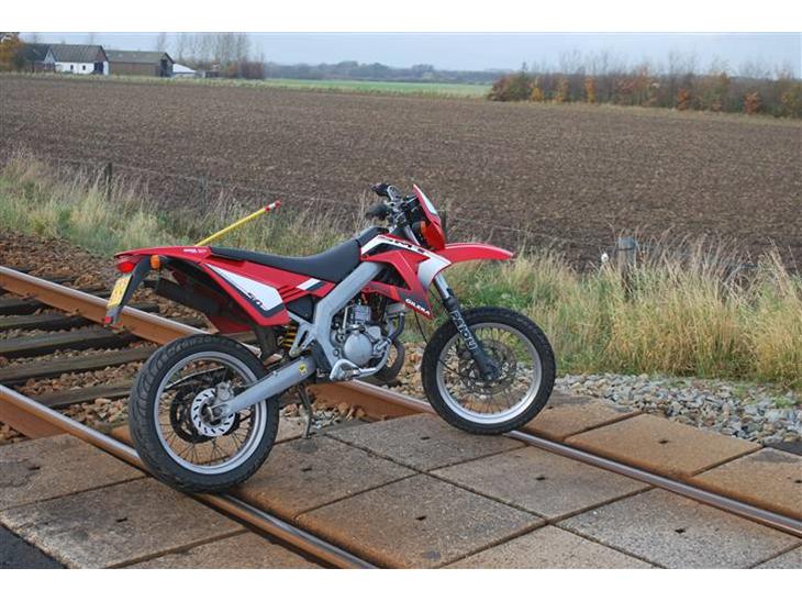 {{currentPhoto.altText}} billede {{currentPhoto.number}}