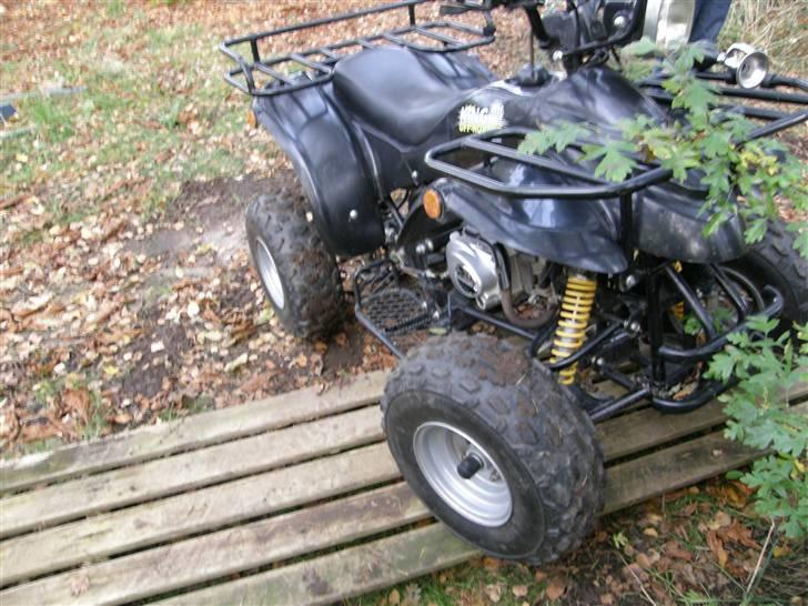 Texas 100-MRX - Forhjulene holder på Nogle brædder træ. billede 11