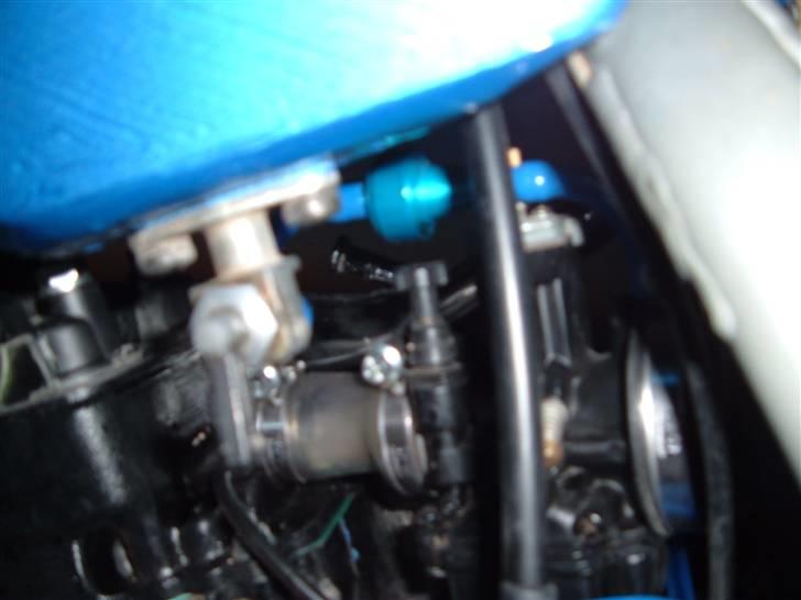 Suzuki RMX - her ses den gennemsigtige gummi-studs billede 10