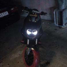 PGO Pmx Naked Carbon Reinholt solgt