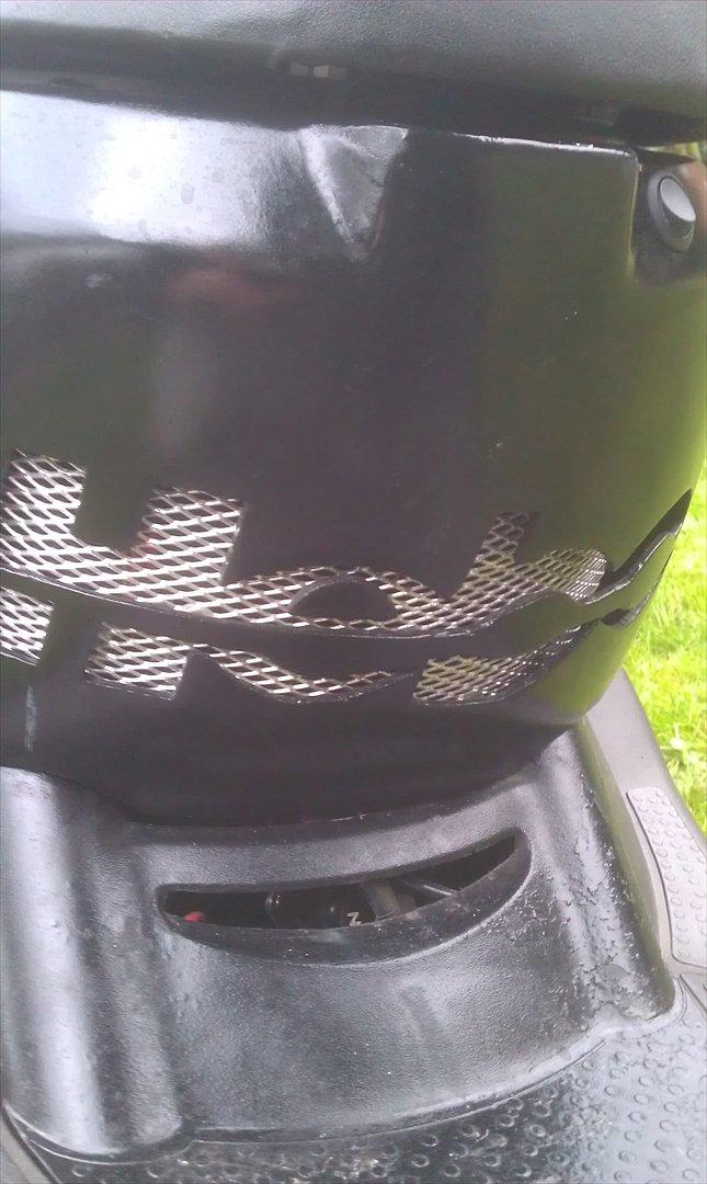 Aprilia Sonic - jeg har selv skåret det ud og sat metal gitter på 
       (HEBO billede 7
