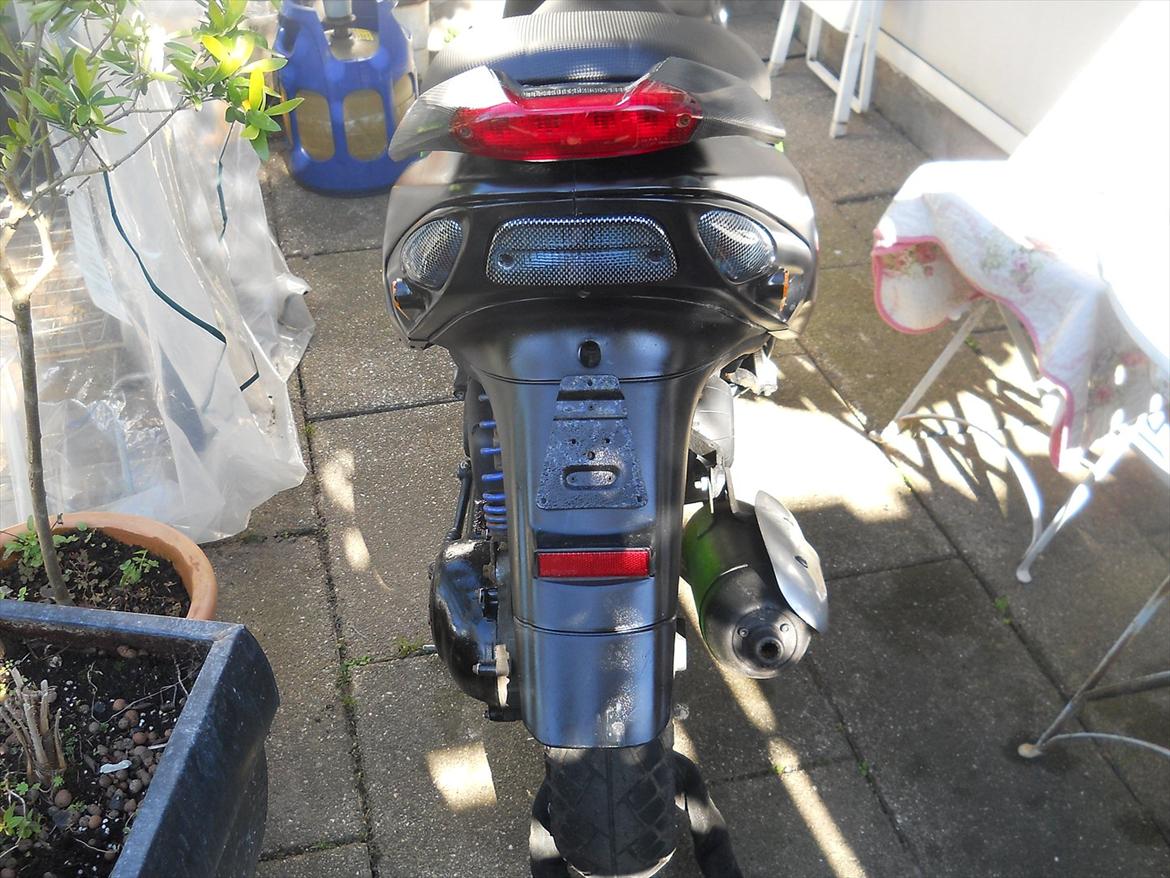 Piaggio NRG MC³ - "carbon" lygte glas billede 7