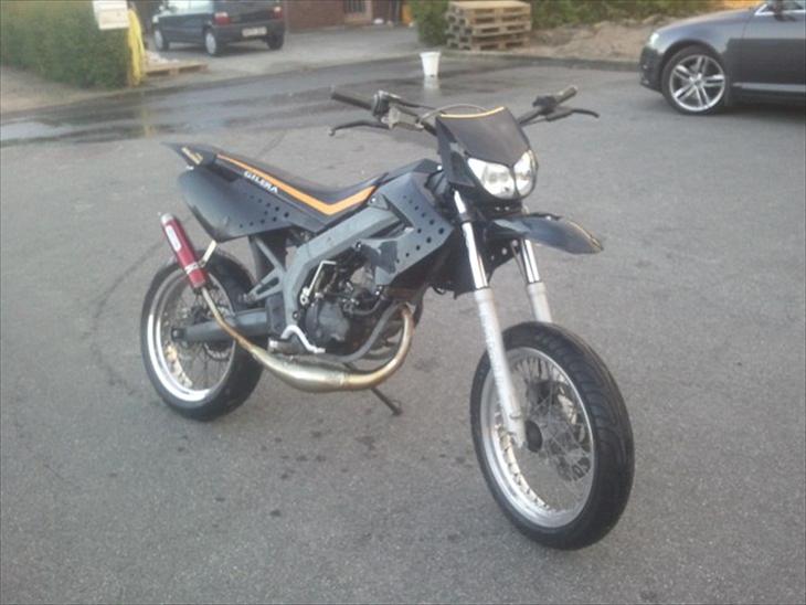 {{currentPhoto.altText}} billede {{currentPhoto.number}}