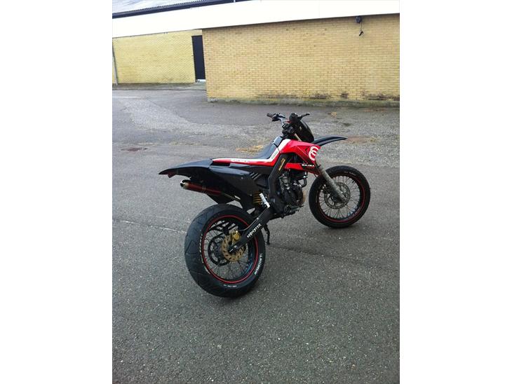 {{currentPhoto.altText}} billede {{currentPhoto.number}}