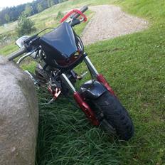 Suzuki street magic (ssm) baghjuls maskinen