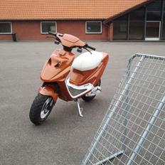 PGO Hot 50 orange lyn solgt for 3000