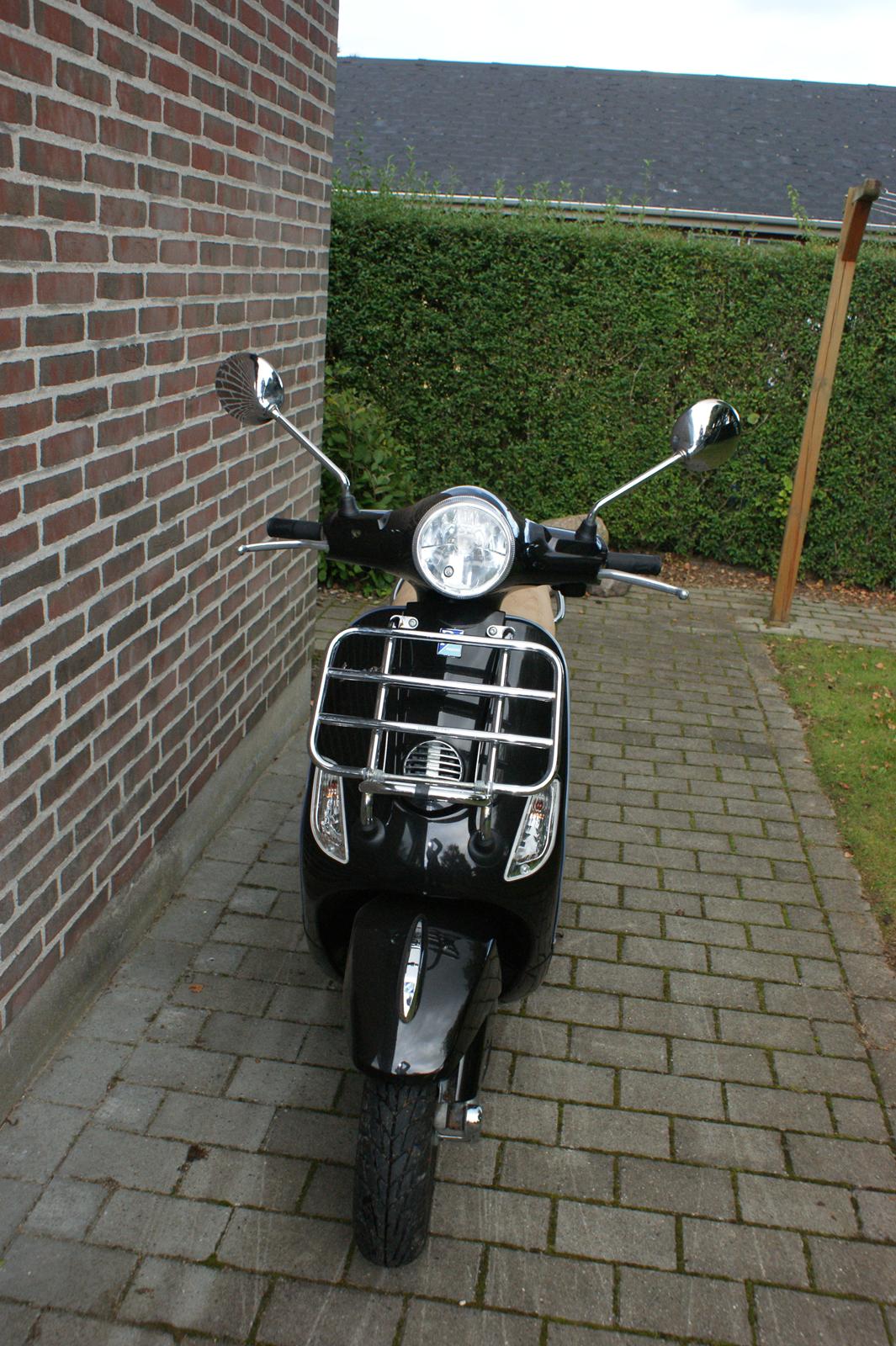 Vespa lx 50 - jeg syntes godt om den crom bagabære. billede 2