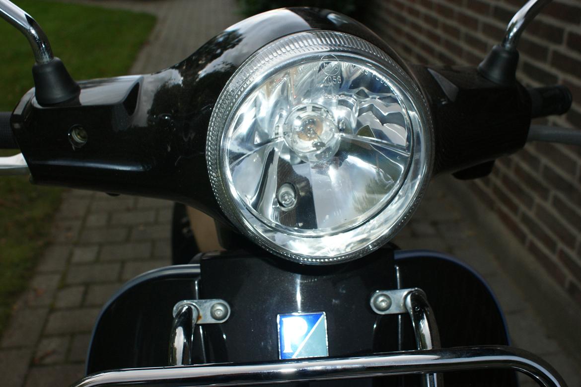 Vespa lx 50 - klar glas i forlygten . det ser godt ud. billede 11