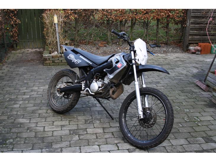 {{currentPhoto.altText}} billede {{currentPhoto.number}}