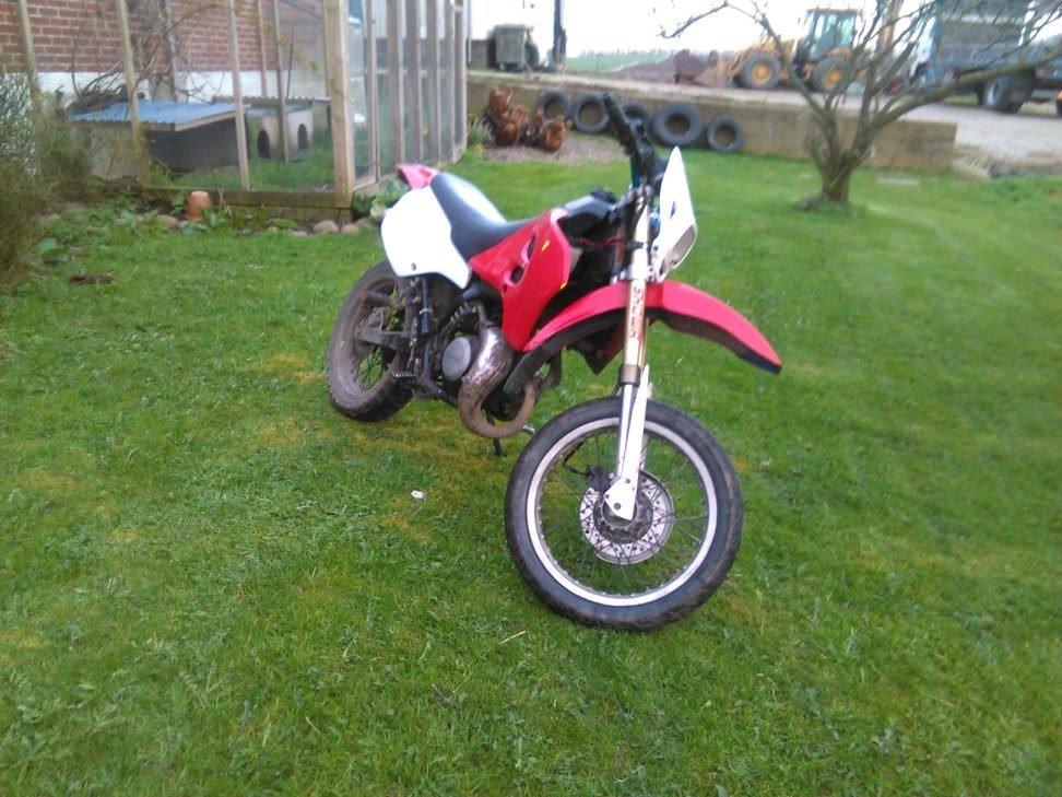 Suzuki Smx hugget op i dele billede 1