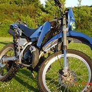 Suzuki RMX (under kniven)