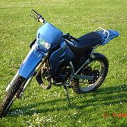 Suzuki RMX (under kniven)