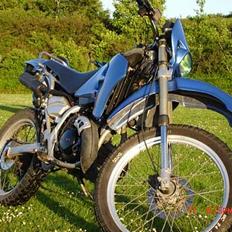 Suzuki RMX (under kniven)