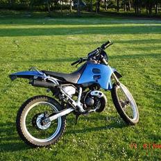 Suzuki RMX (under kniven)