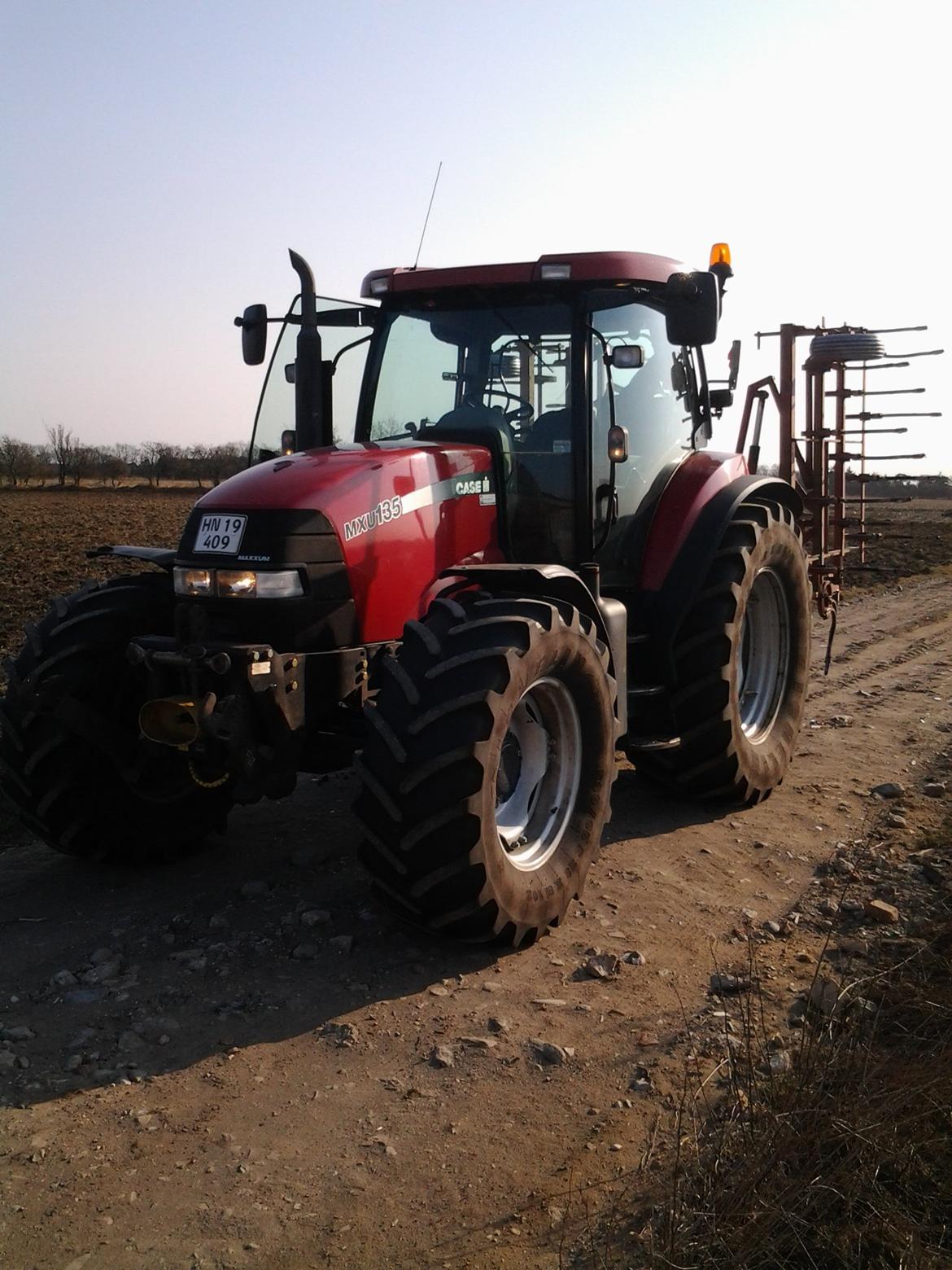 Case IH MXU 135 - var lige ude og harve lidt billede 3